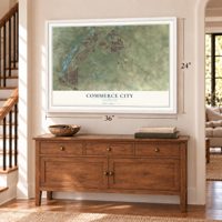 Commerce City, Colorado map, 24 x 36 inch print in a white frame above a dresser by a staircase