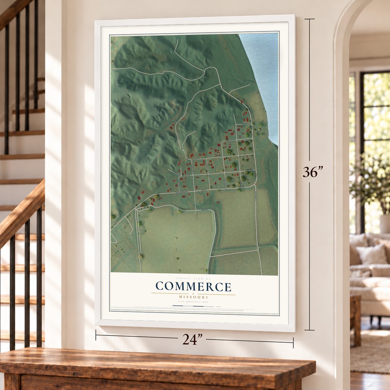 Commerce, Missouri map, 24 x 36 inch print in a white frame by a staircase