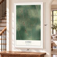Como, Mississippi map, 24 x 36 inch print in a white frame by a staircase