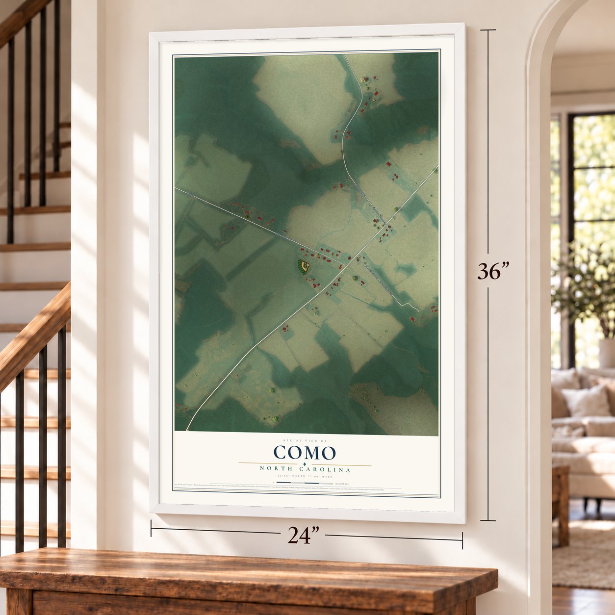 Como, North Carolina map, 24 x 36 inch print in a white frame by a staircase