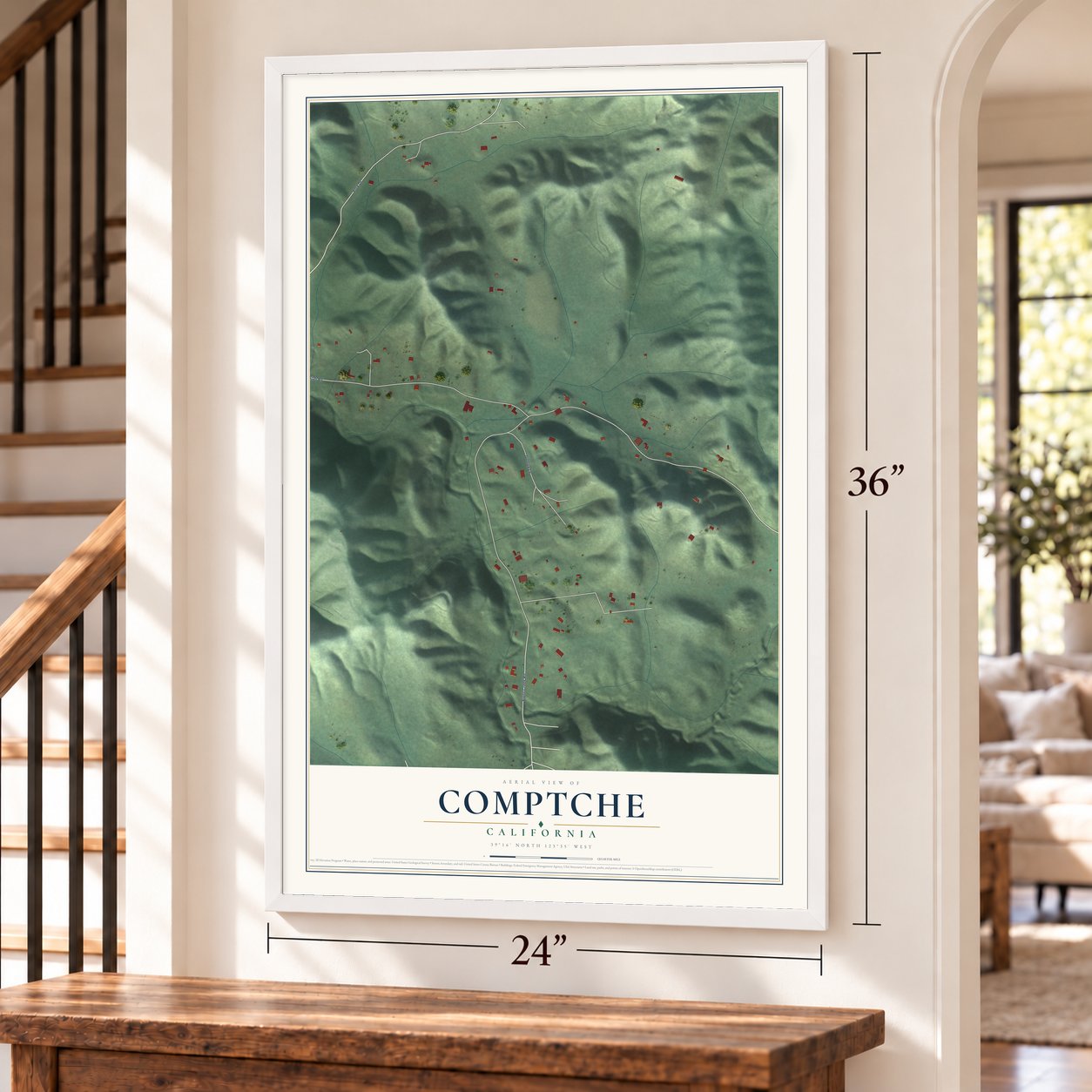 Comptche, California map, 24 x 36 inch print in a white frame by a staircase