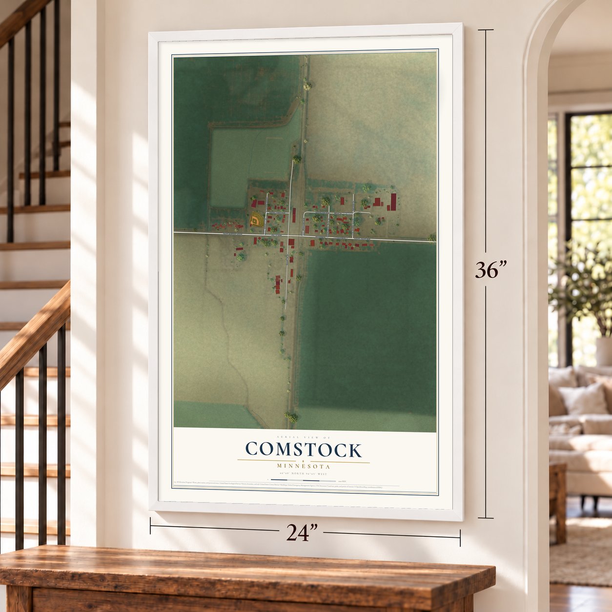 Comstock, Minnesota map, 24 x 36 inch print in a white frame by a staircase