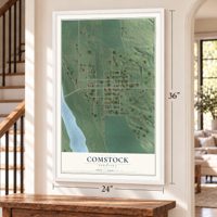 Comstock, Nebraska map, 24 x 36 inch print in a white frame by a staircase