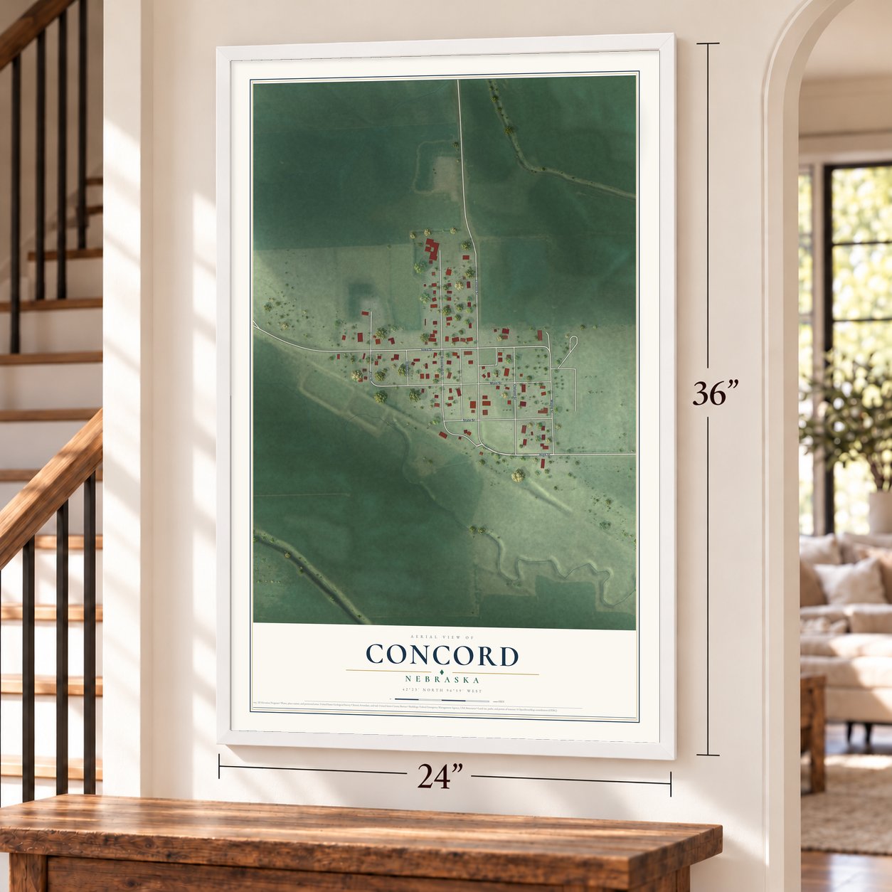 Concord, Nebraska map, 24 x 36 inch print in a white frame by a staircase