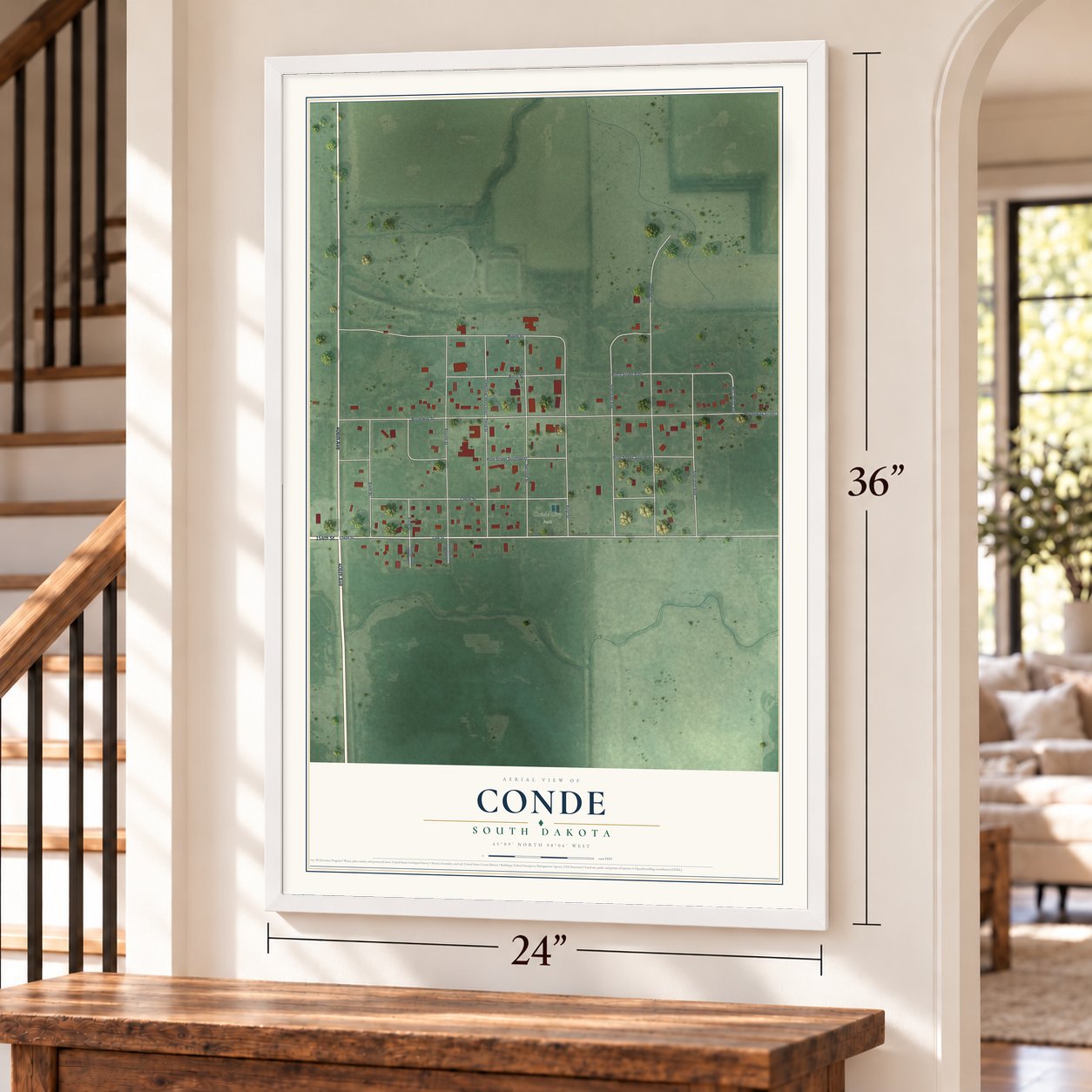 Conde, South Dakota map, 24 x 36 inch print in a white frame by a staircase