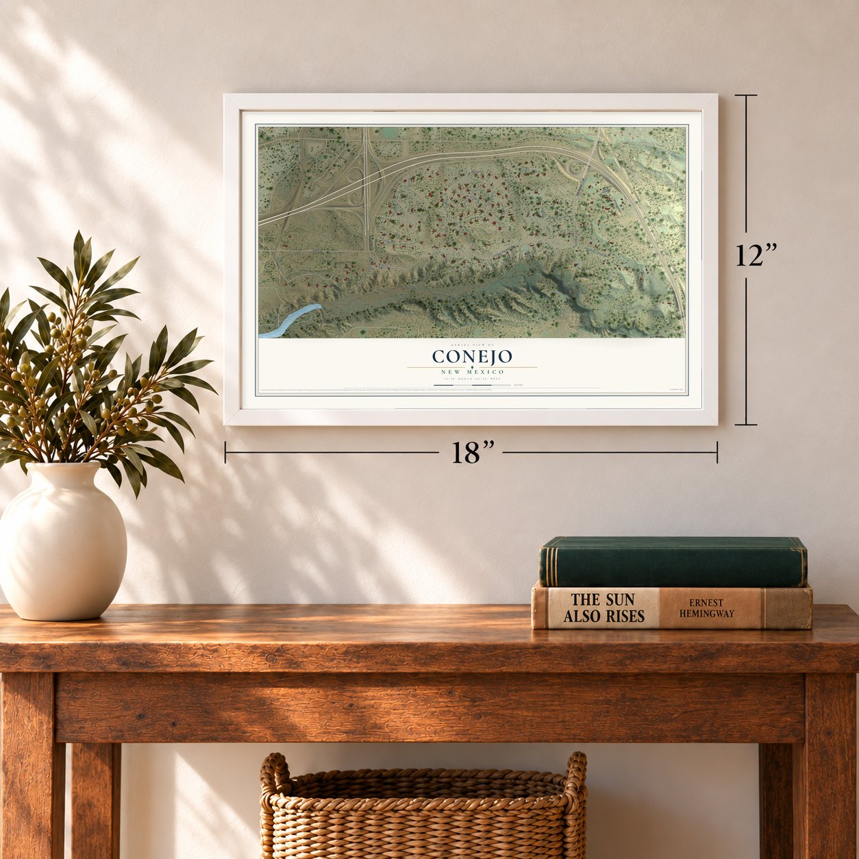 Conejo, New Mexico map, 12 x 18 inch print in a white frame in an entryway