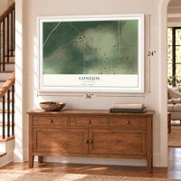 Conejos, Colorado map, 24 x 36 inch print in a white frame above a dresser by a staircase