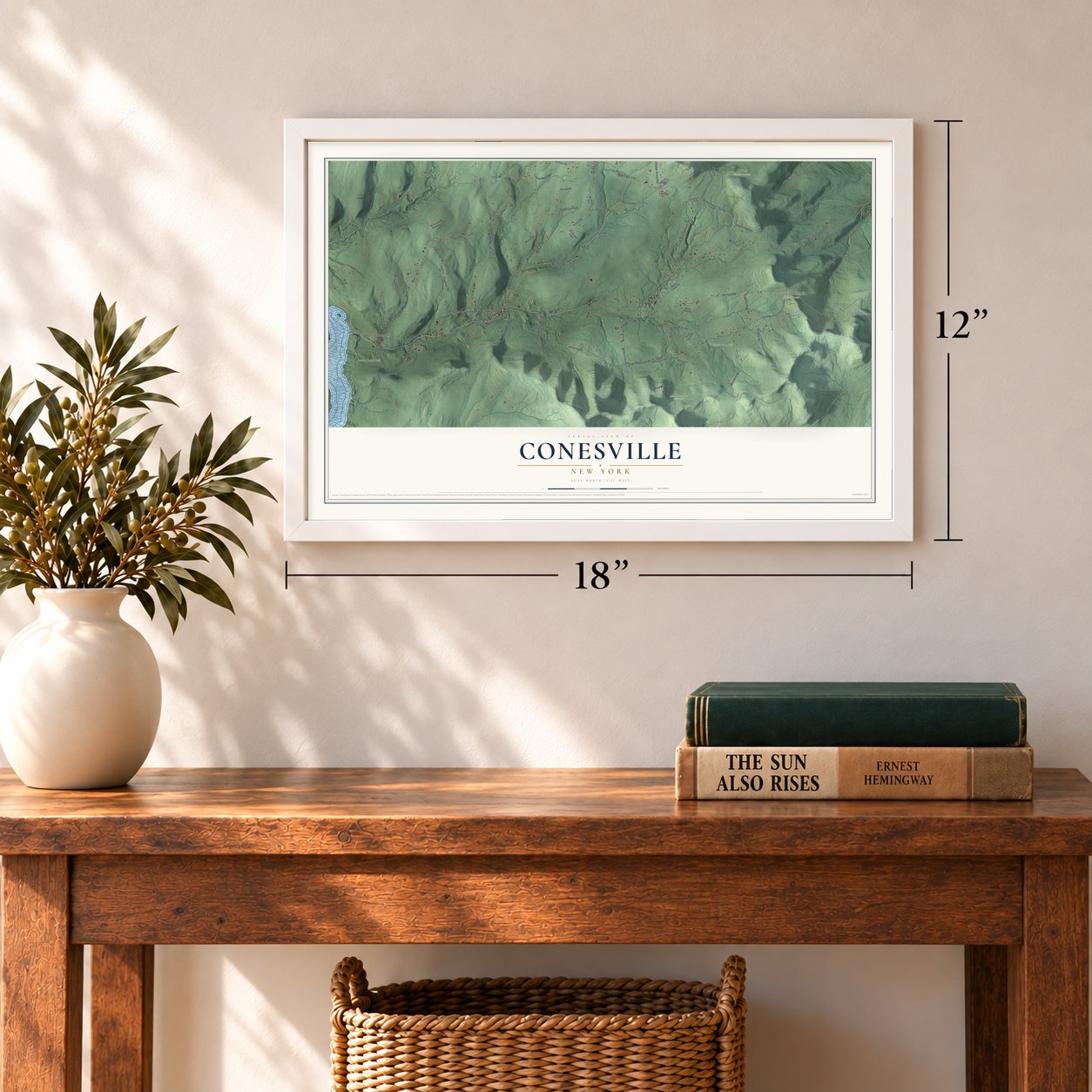Conesville, New York map, 12 x 18 inch print in a white frame in an entryway