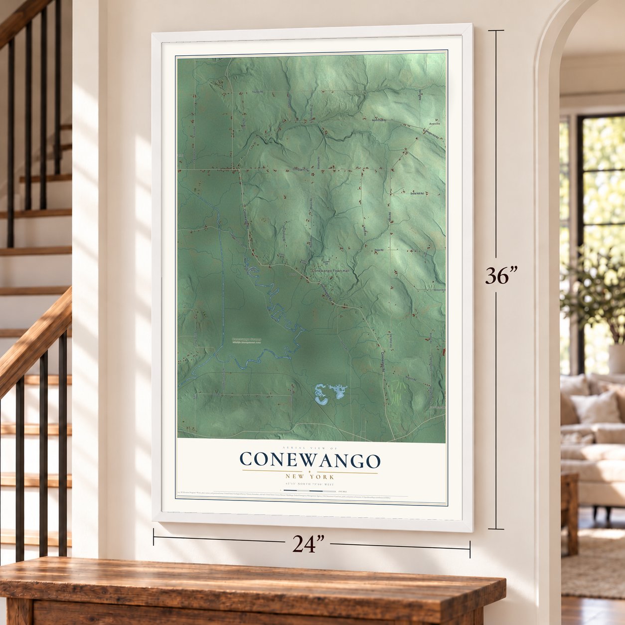 Conewango, New York map, 24 x 36 inch print in a white frame by a staircase