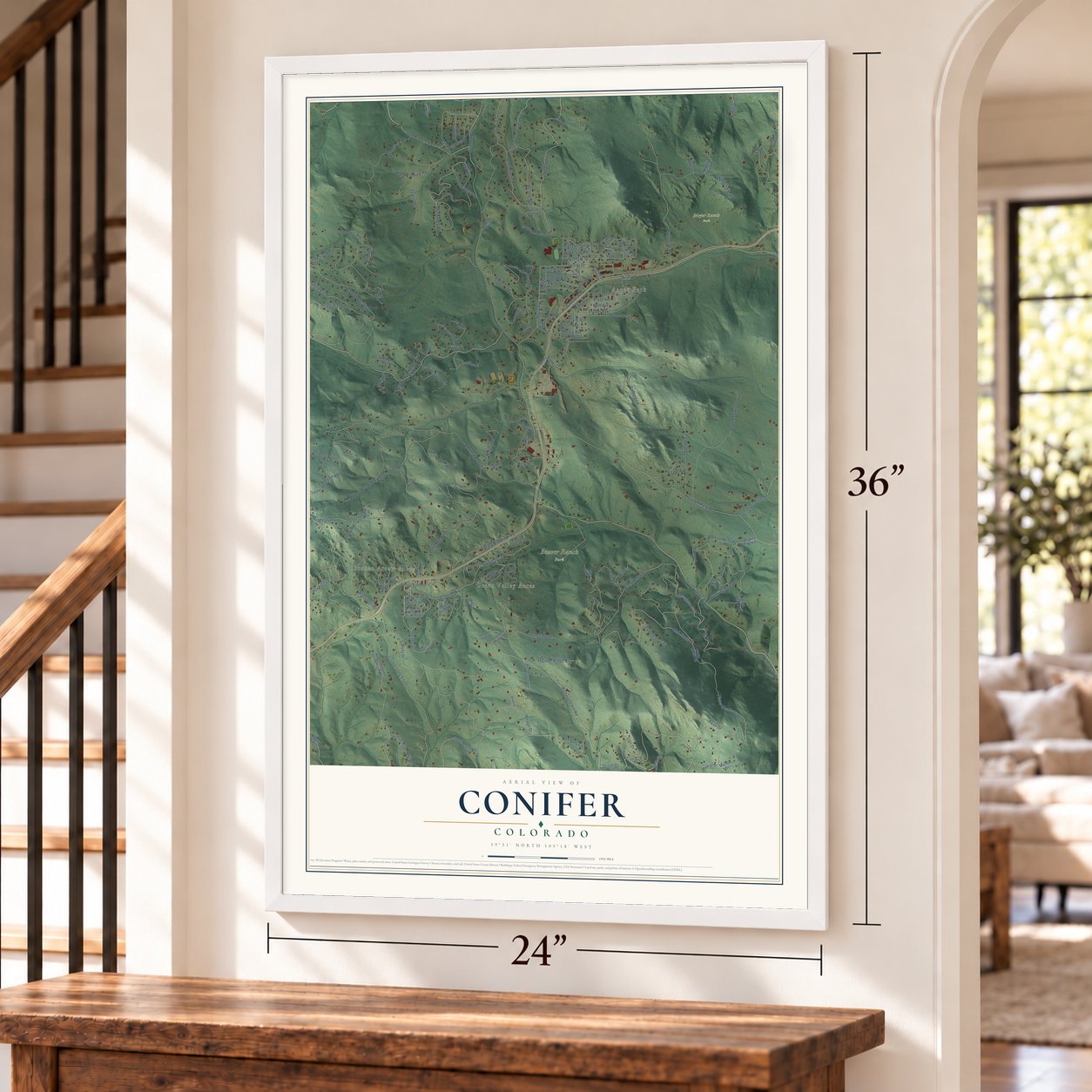 Conifer, Colorado map, 24 x 36 inch print in a white frame by a staircase