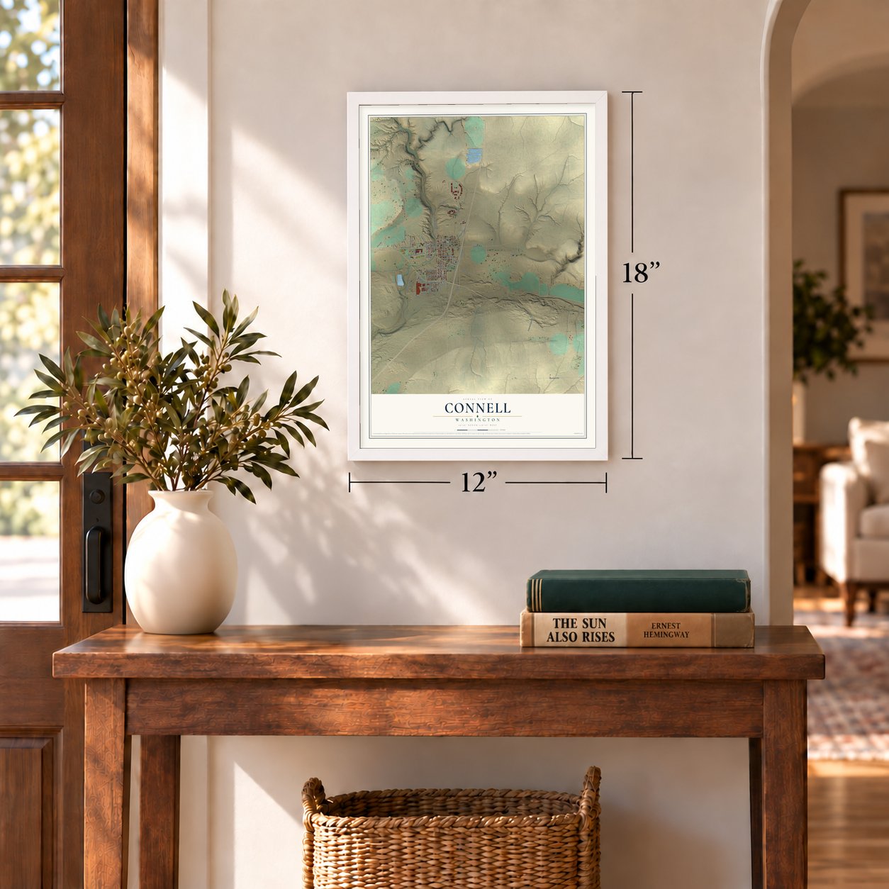 Connell, Washington map, 12 x 18 inch print in a white frame in an entryway