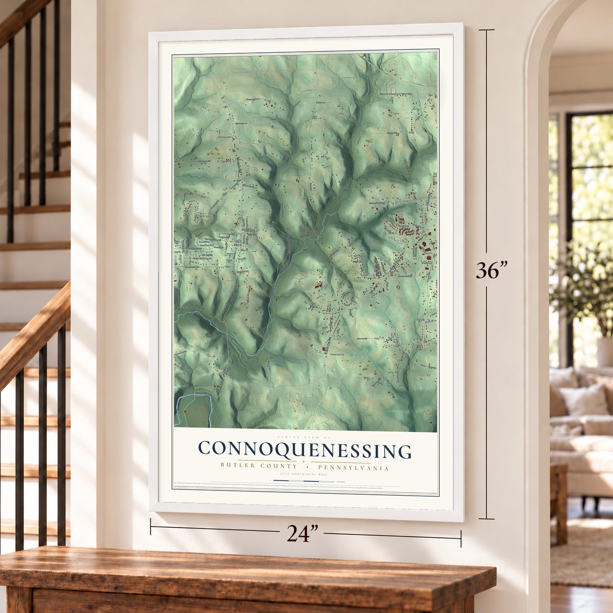 Connoquenessing, Butler County, Pennsylvania map, 24 x 36 inch print in a white frame by a staircase