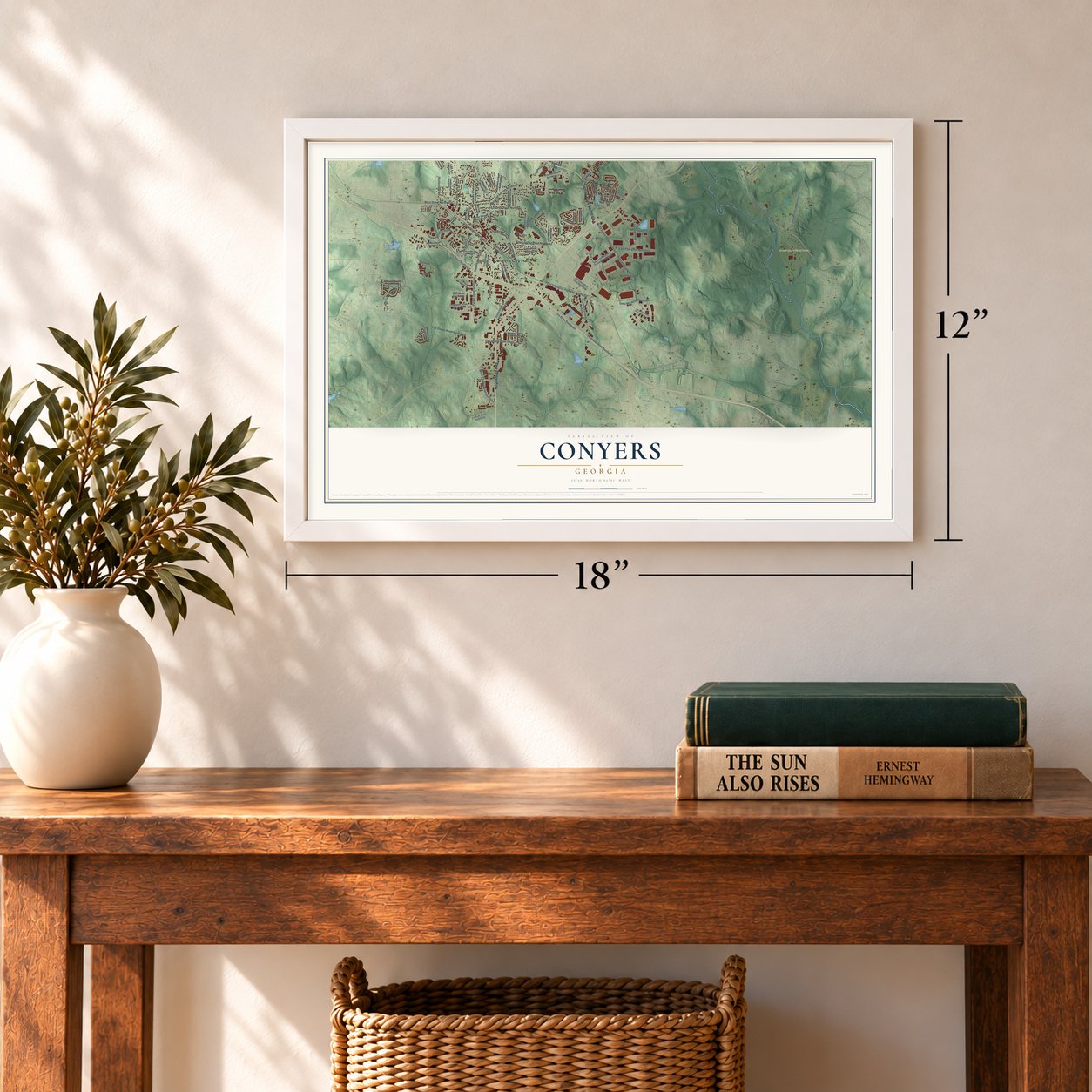 Conyers, Georgia map, 12 x 18 inch print in a white frame in an entryway