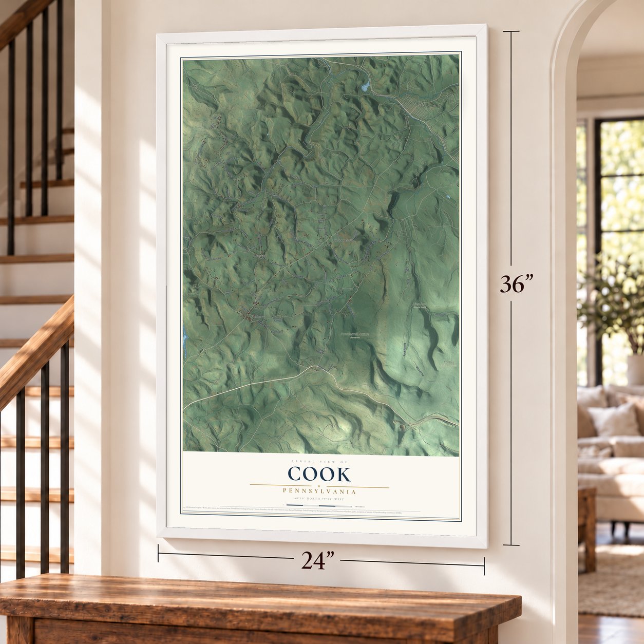 Cook, Pennsylvania map, 24 x 36 inch print in a white frame by a staircase
