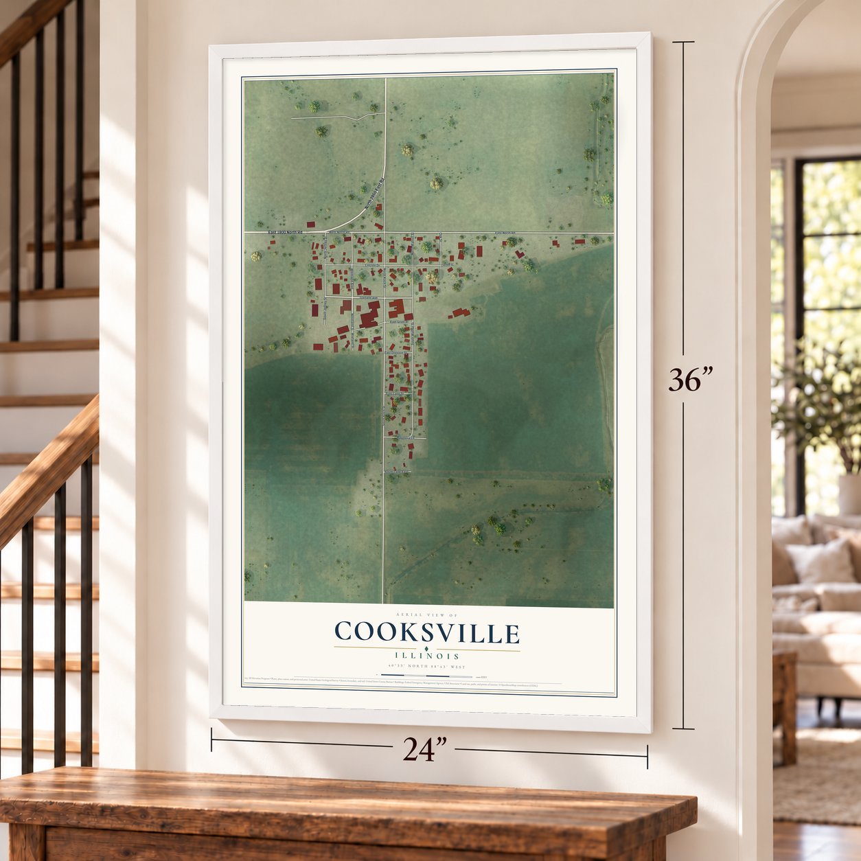 Cooksville, Illinois map, 24 x 36 inch print in a white frame by a staircase