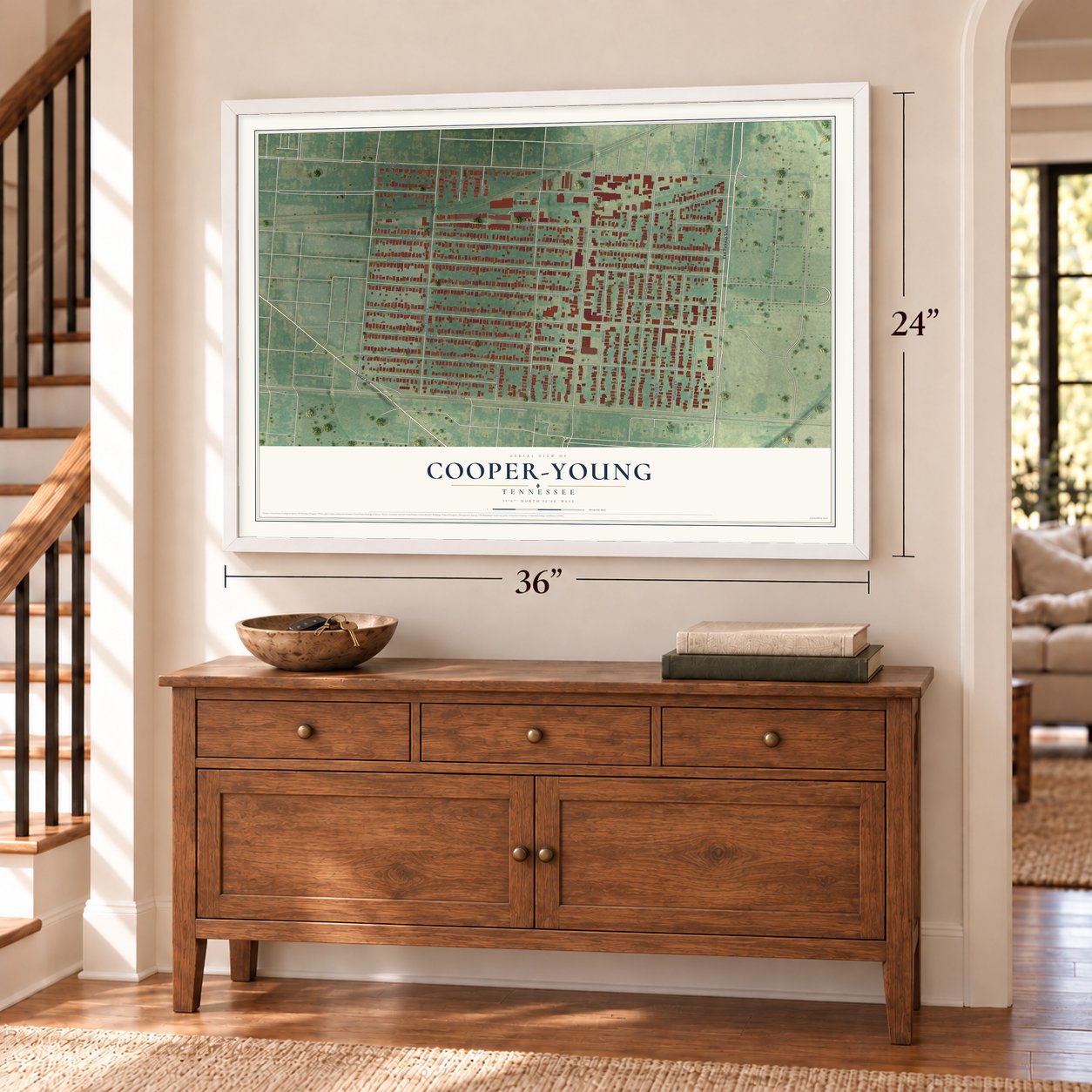 Cooper-Young, Tennessee map, 24 x 36 inch print in a white frame above a dresser by a staircase