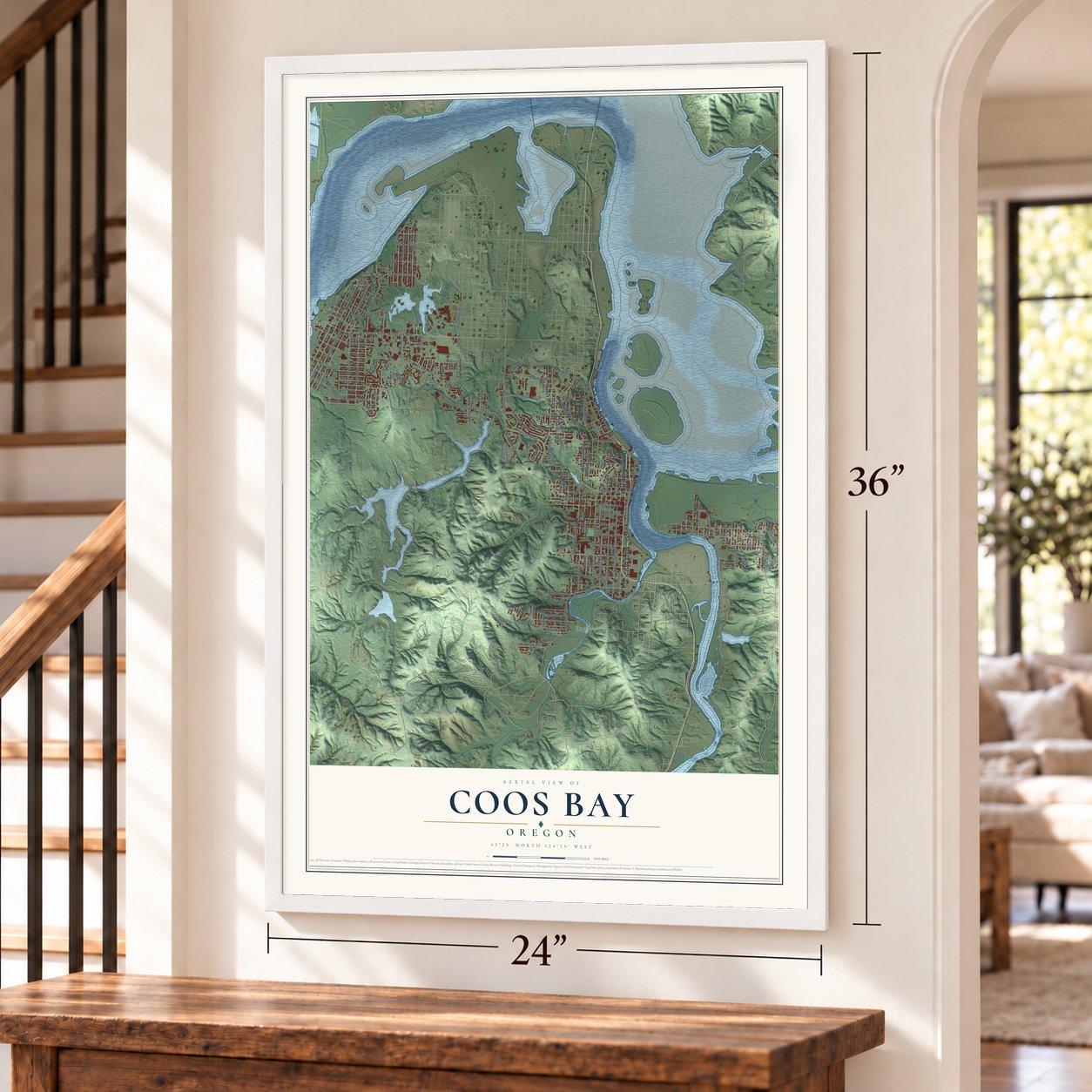 Coos Bay, Oregon map, 24 x 36 inch print in a white frame by a staircase