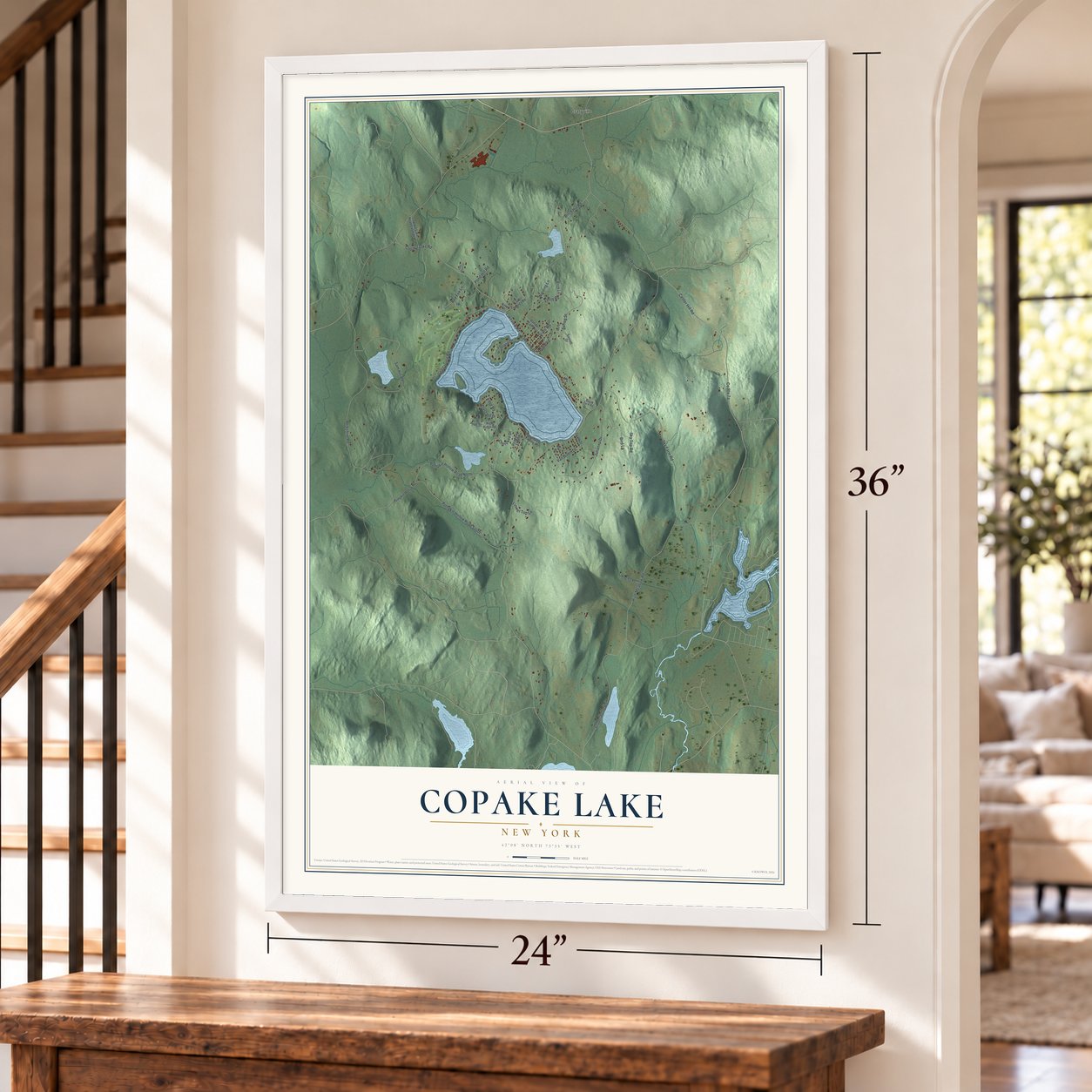 Copake Lake, New York map, 24 x 36 inch print in a white frame by a staircase