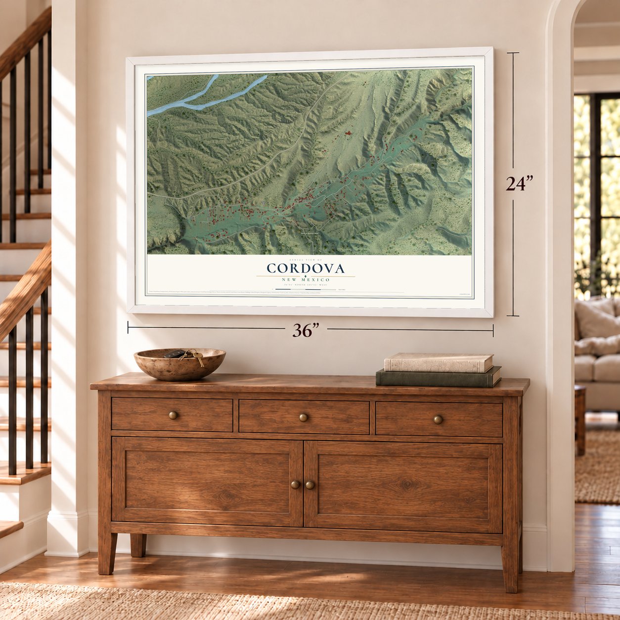 Cordova, New Mexico map, 24 x 36 inch print in a white frame above a dresser by a staircase