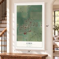 Corn, Oklahoma map, 24 x 36 inch print in a white frame by a staircase
