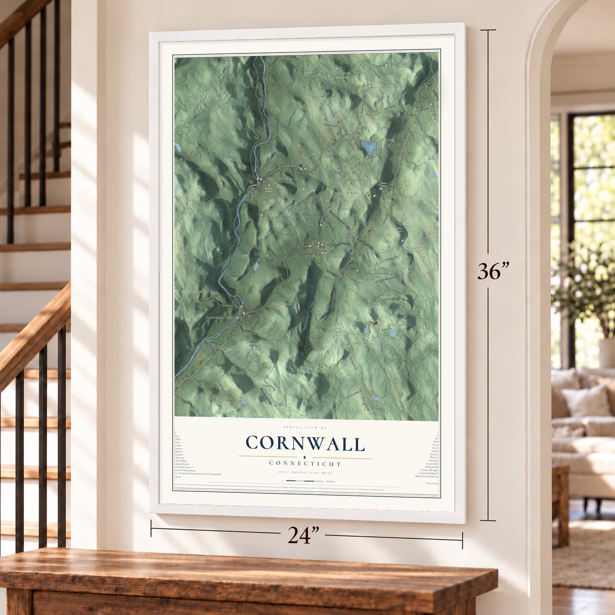 Cornwall, Connecticut map, 24 x 36 inch print in a white frame by a staircase