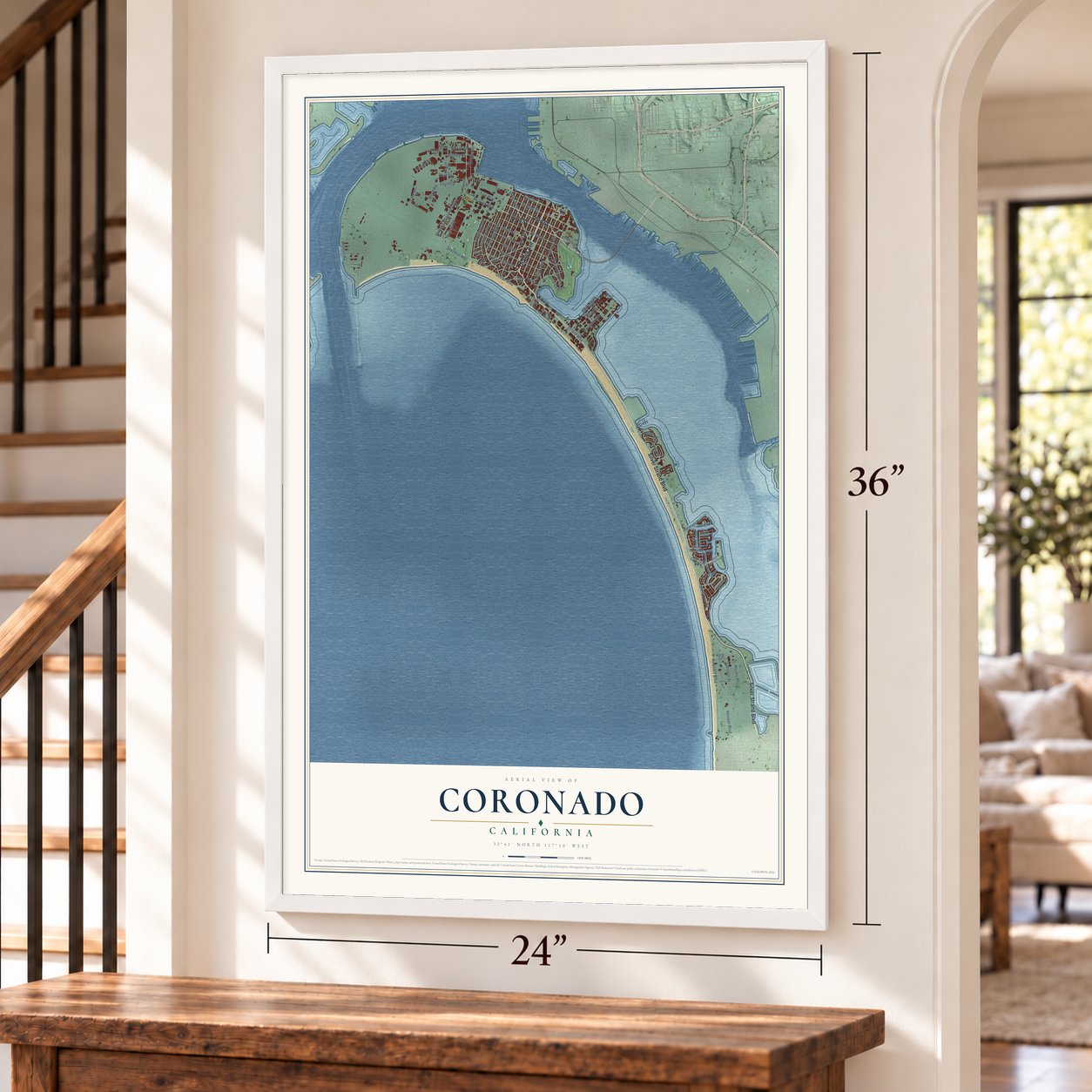 Coronado, California map, 24 x 36 inch print in a white frame by a staircase