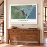 Corpus Christi, Texas map, 24 x 36 inch print in a white frame above a dresser by a staircase