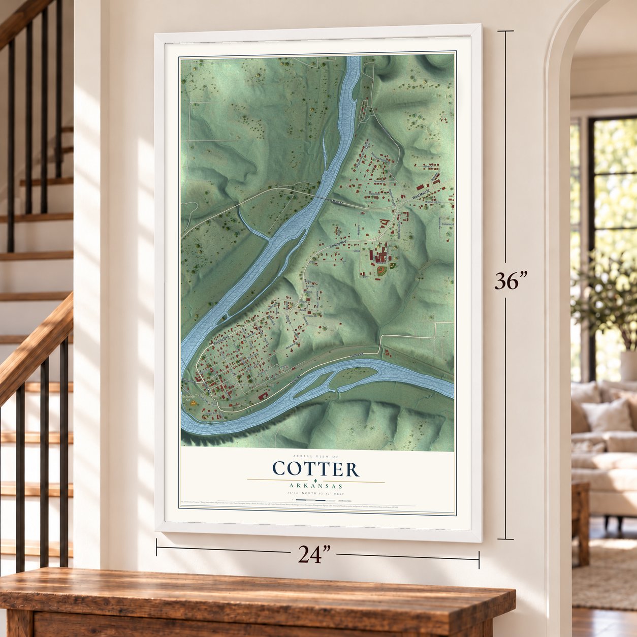 Cotter, Arkansas map, 24 x 36 inch print in a white frame by a staircase