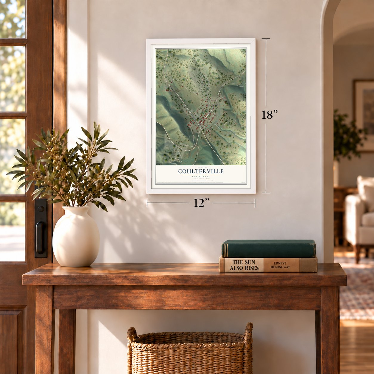 Coulterville, California map, 12 x 18 inch print in a white frame in an entryway