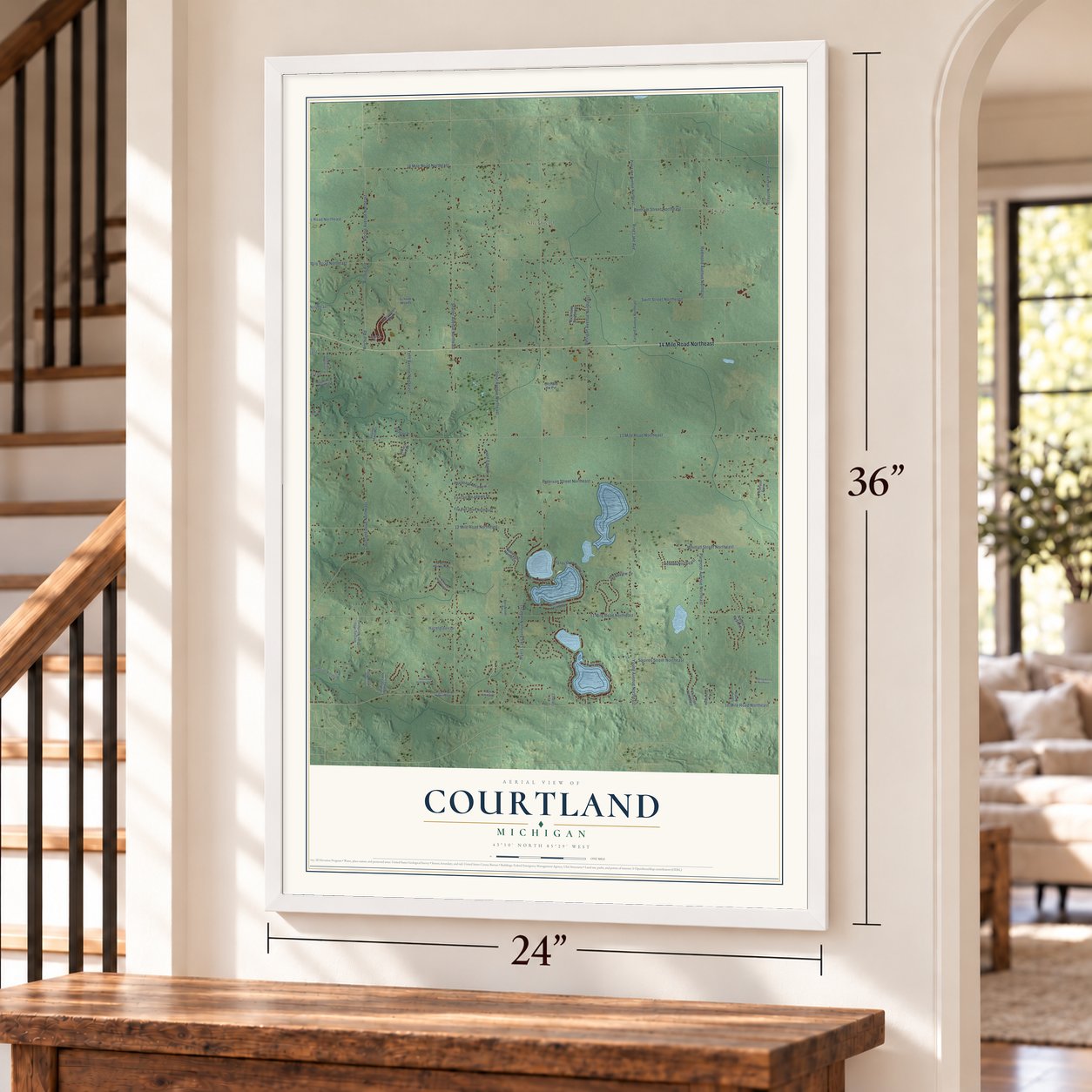 Courtland, Michigan map, 24 x 36 inch print in a white frame by a staircase