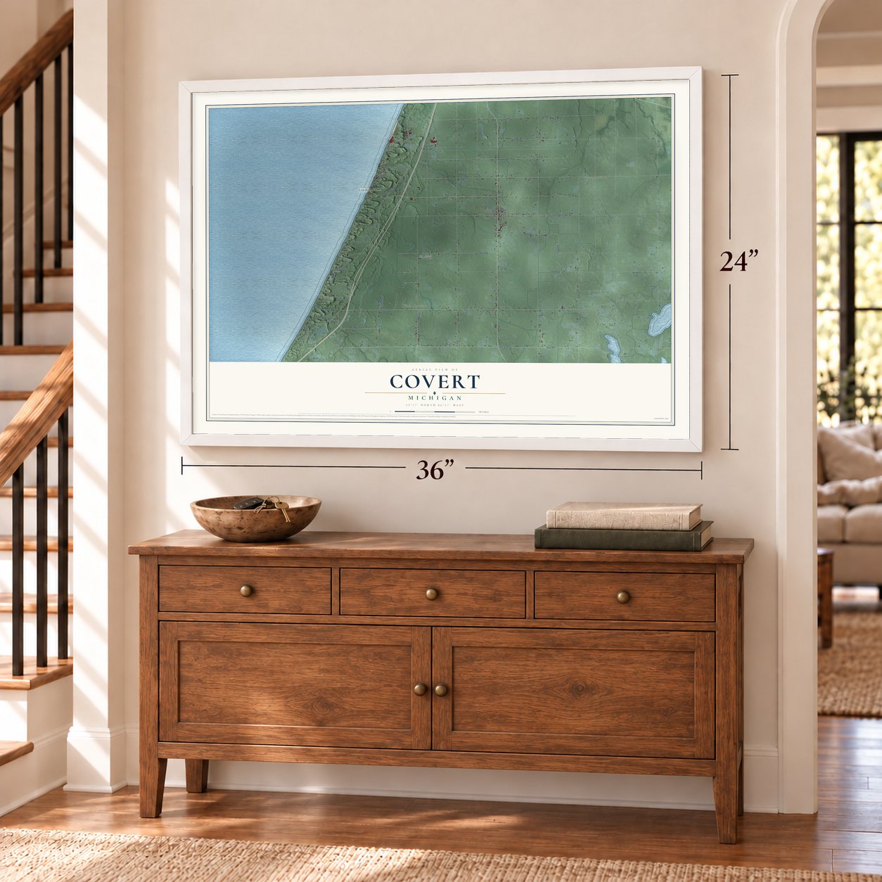Covert, Michigan map, 24 x 36 inch print in a white frame above a dresser by a staircase