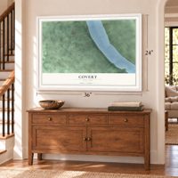 Covert, New York map, 24 x 36 inch print in a white frame above a dresser by a staircase
