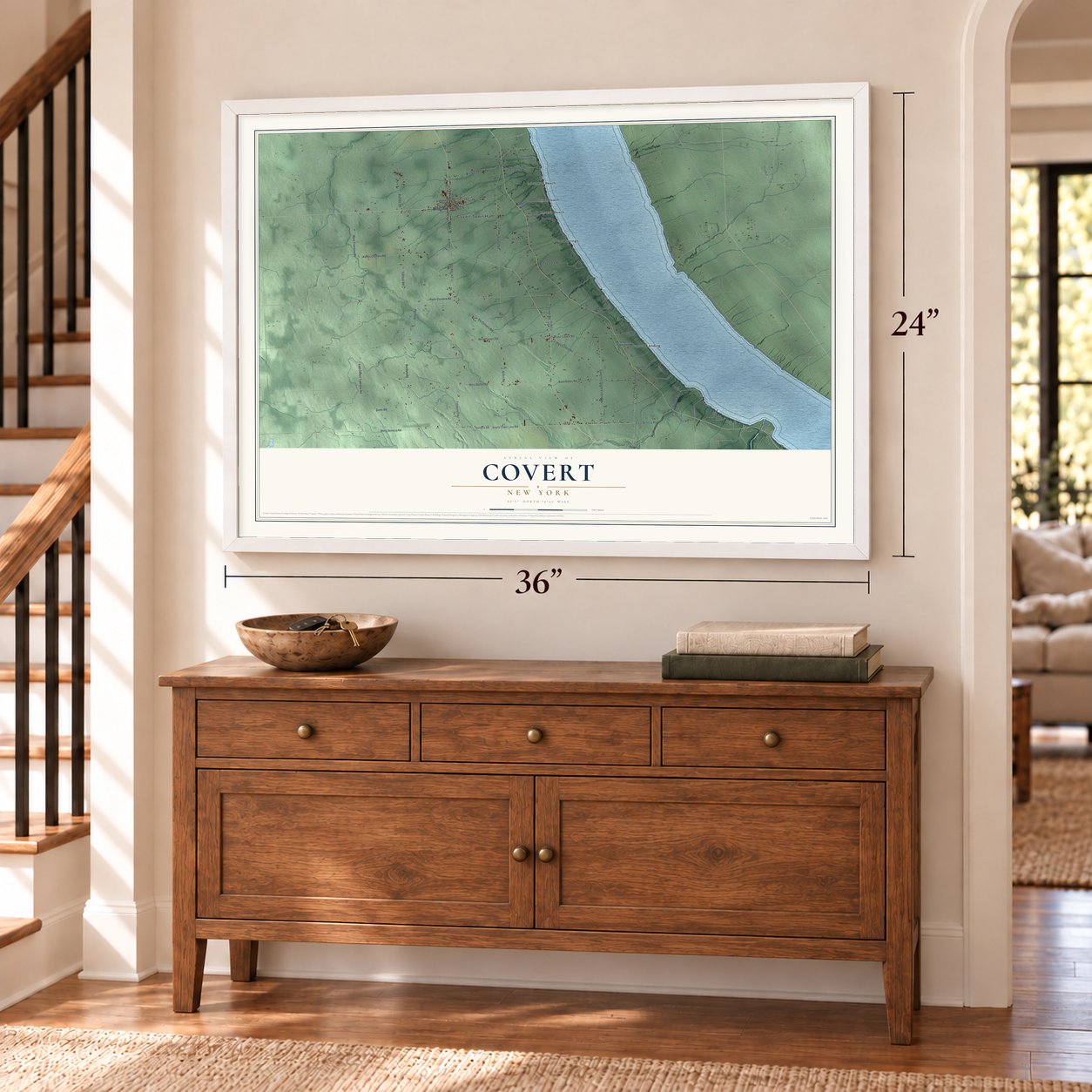 Covert, New York map, 24 x 36 inch print in a white frame above a dresser by a staircase