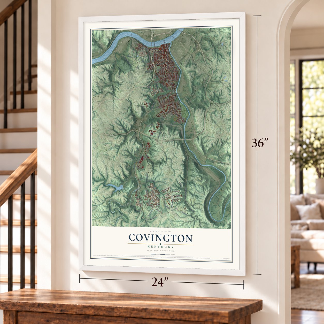 Covington, Kentucky map, 24 x 36 inch print in a white frame by a staircase