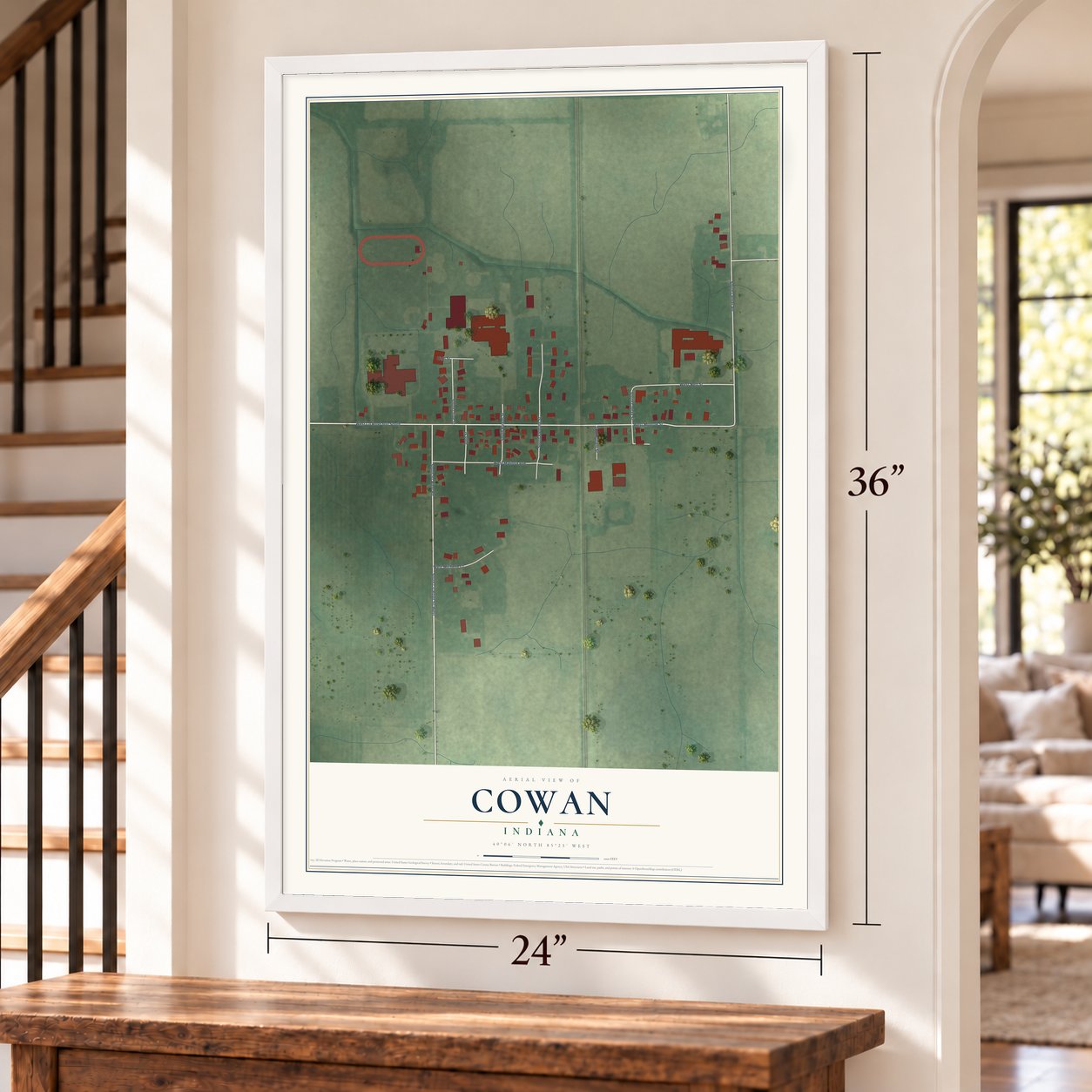 Cowan, Indiana map, 24 x 36 inch print in a white frame by a staircase