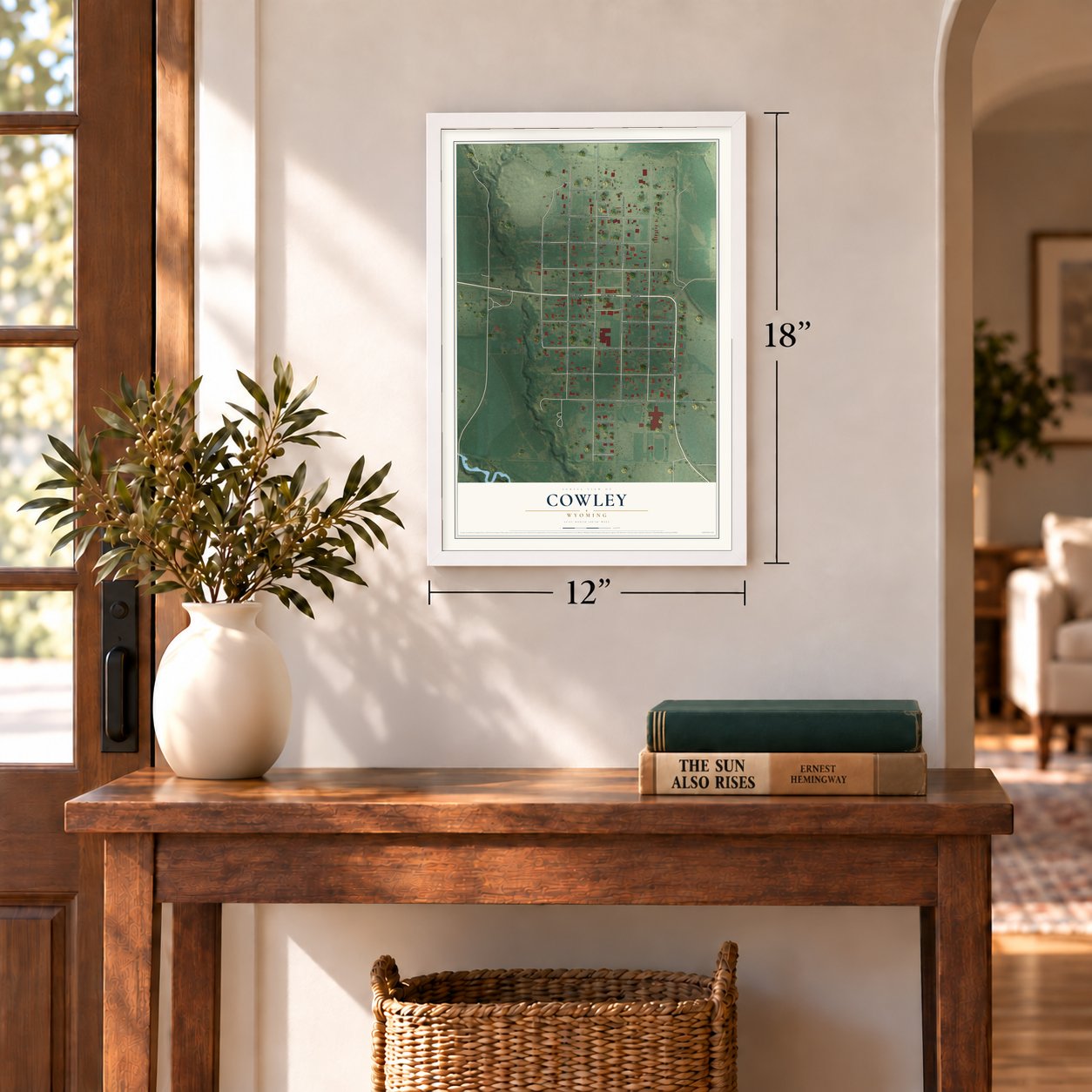 Cowley, Wyoming map, 12 x 18 inch print in a white frame in an entryway