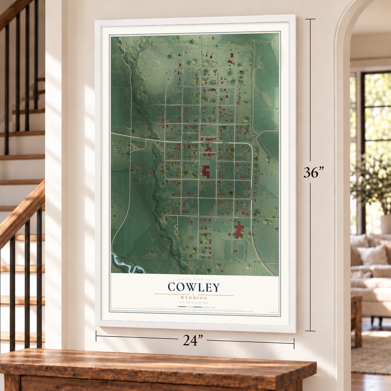 Cowley, Wyoming map, 24 x 36 inch print in a white frame by a staircase