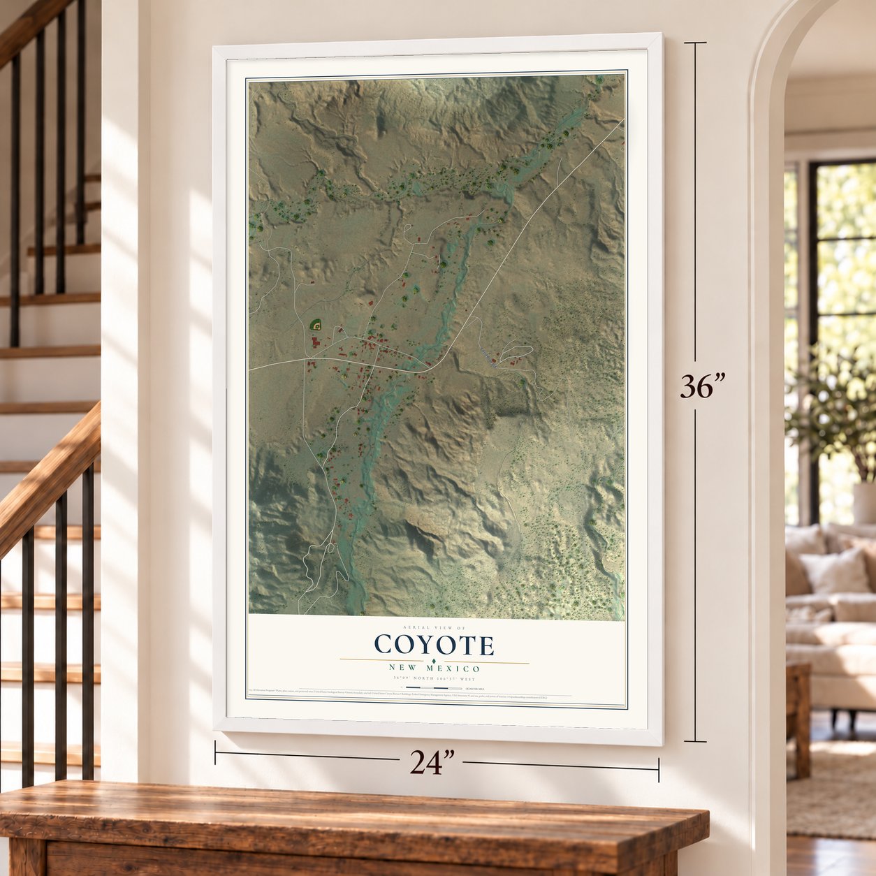Coyote, New Mexico map, 24 x 36 inch print in a white frame by a staircase