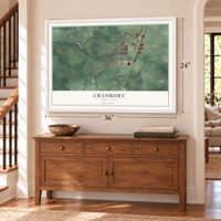 Cranbury, New Jersey map, 24 x 36 inch print in a white frame above a dresser by a staircase