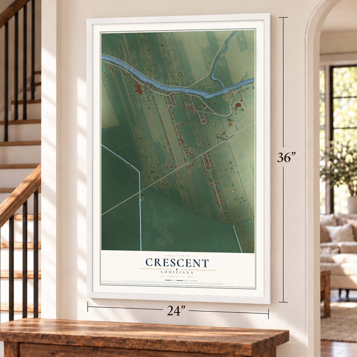 Crescent, Louisiana map, 24 x 36 inch print in a white frame by a staircase