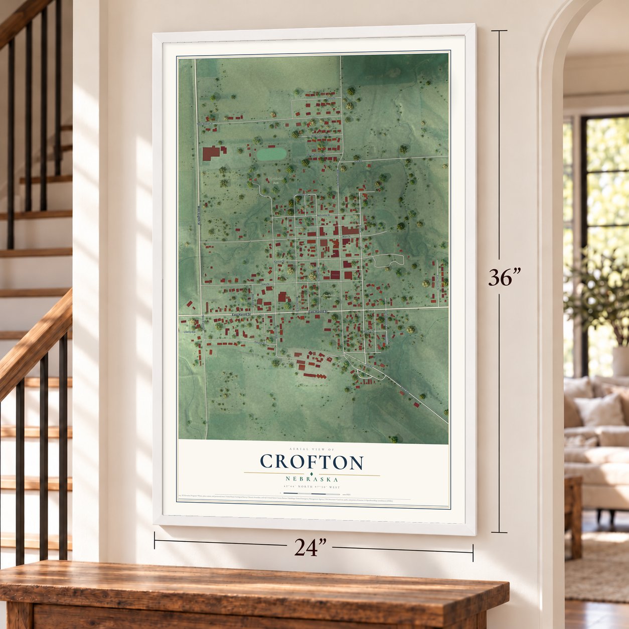 Crofton, Nebraska map, 24 x 36 inch print in a white frame by a staircase