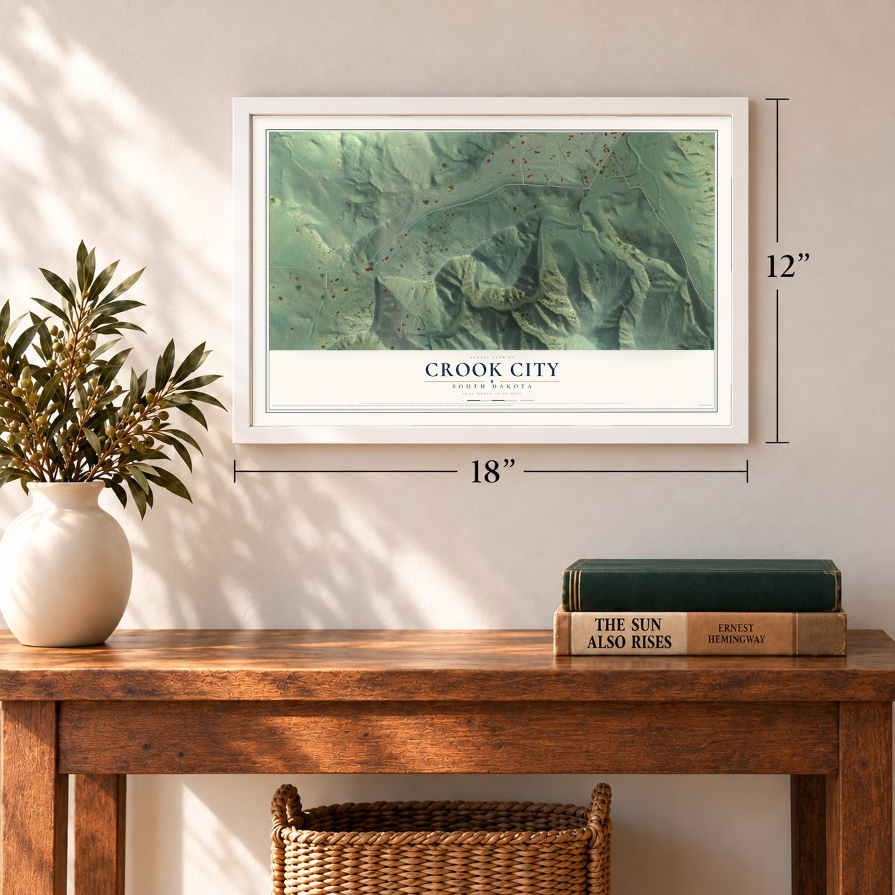 Crook City, South Dakota map, 12 x 18 inch print in a white frame in an entryway