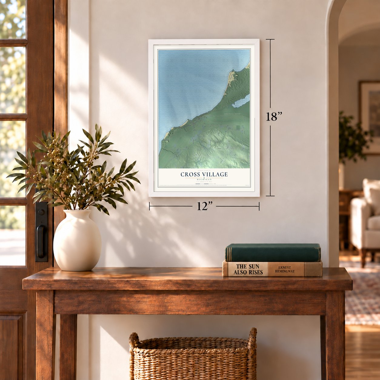 Cross Village, Michigan map, 12 x 18 inch print in a white frame in an entryway