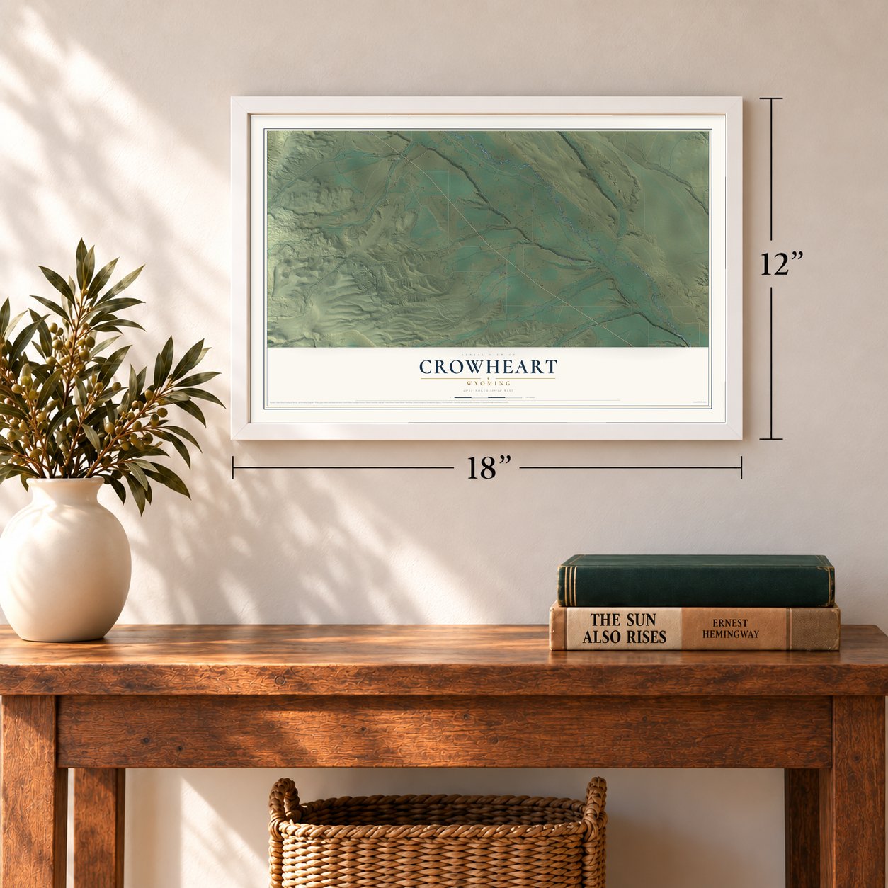 Crowheart, Wyoming map, 12 x 18 inch print in a white frame in an entryway