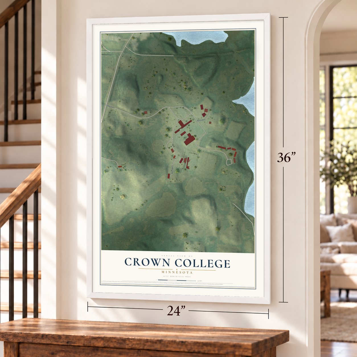 Crown College, Minnesota map, 24 x 36 inch print in a white frame by a staircase