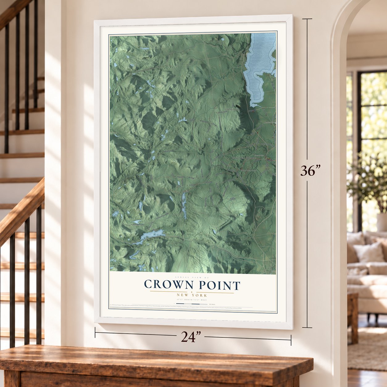 Crown Point, New York map, 24 x 36 inch print in a white frame by a staircase