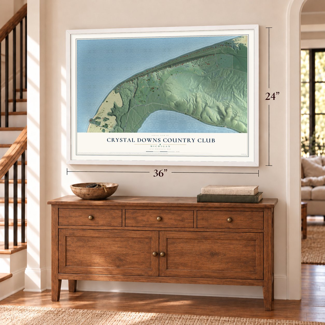 Crystal Downs Country Club, Michigan map, 24 x 36 inch print in a white frame above a dresser by a staircase