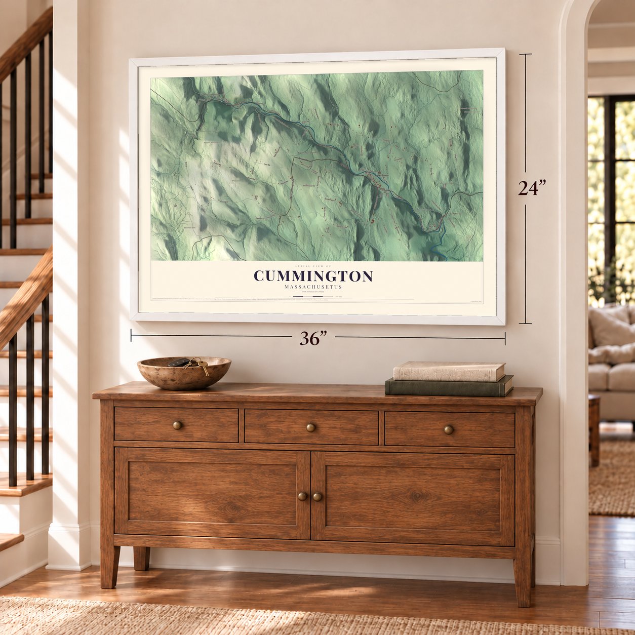 Cummington, Massachusetts map, 24 x 36 inch print in a white frame above a dresser by a staircase