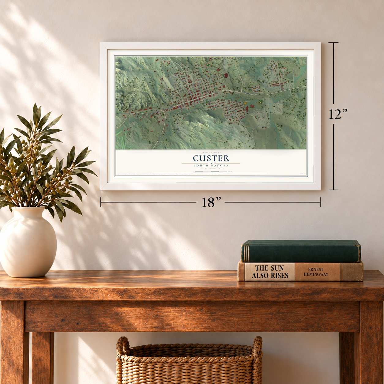 Custer, South Dakota map, 12 x 18 inch print in a white frame in an entryway