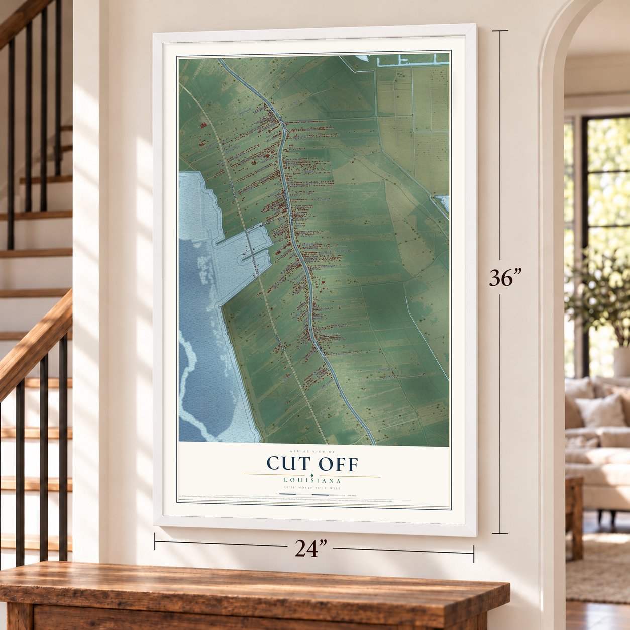 Cut Off, Louisiana map, 24 x 36 inch print in a white frame by a staircase